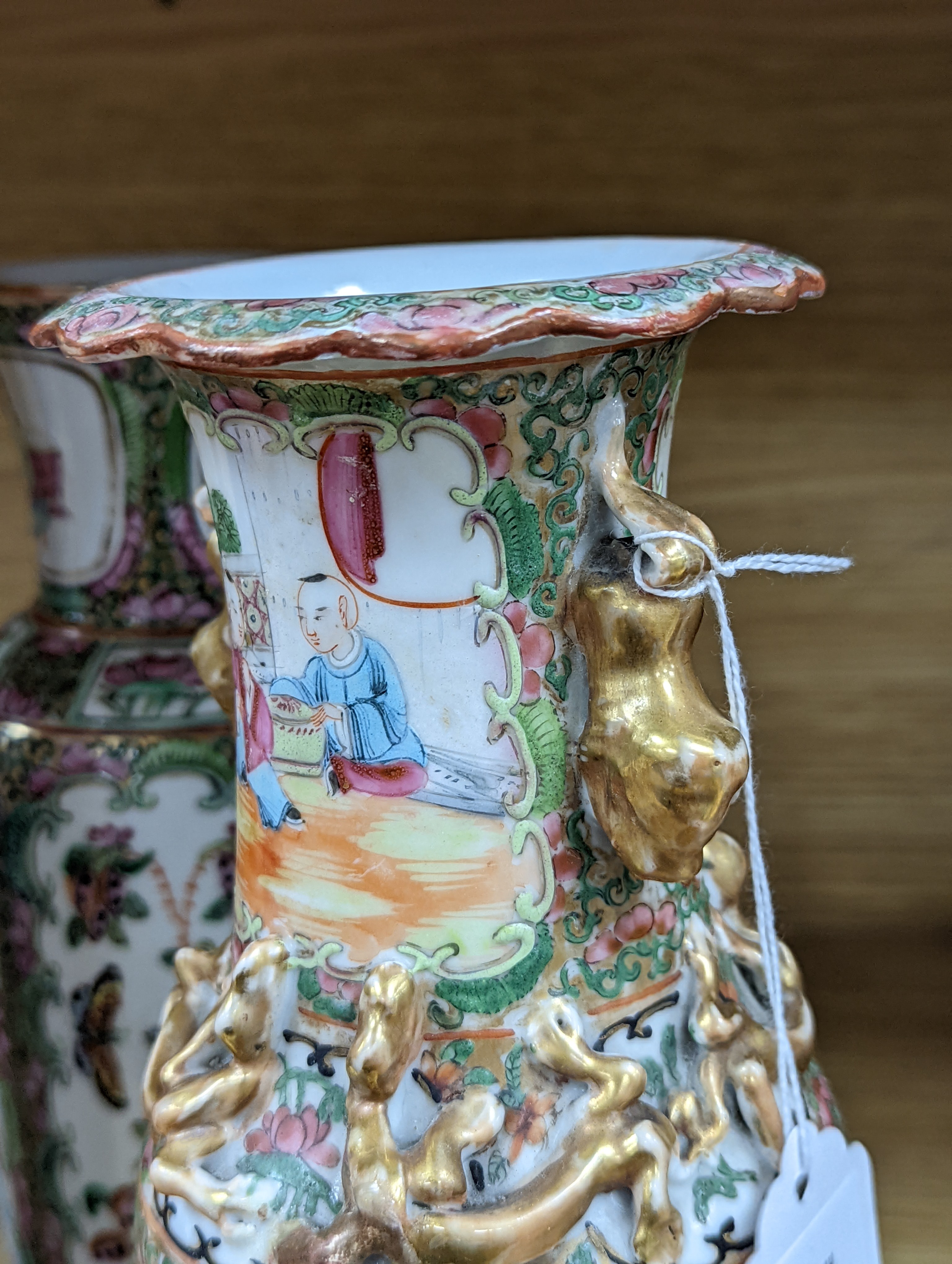 Two Chinese famille rose vases, late 19th century, tallest 26 cm, one wood stand, some restoration